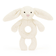 Front View: Soothe and entertain! The Jellycat Bashful Cream Bunny Ring Rattle features a soft bunny for cuddles and a rattling ring for playtime.