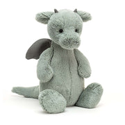 Fierce cuddles, not fire! This Bashful Dragon boasts soft fur, suedey horns & playful details. Perfect for mythical adventures, big or small.