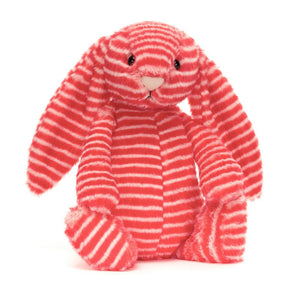 Product slightly to an angle: Jellycat Bashful Evey Bunny plush toy in profile, showing its red and cream stripes.