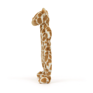 Cuddles on the Go: The Jellycat Bashful Giraffe Comforter combines a huggable giraffe with a cozy cream blanket for ultimate comfort while traveling or at home. (Side view)