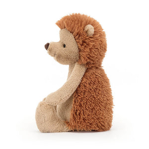 Ready to roll! Jellycat's Bashful Hedgehog boasts soft fur, cute spines, and weighted feet for playful adventures and bedtime snuggles.