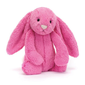 Jellycat Bashful Hot Pink Bunny in a sitting  position, with long floppy ears, a pale pink nose. 