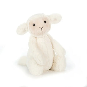 So soft, you'll swoon! See the fluffy details of Jellycat's Bashful Lamb – big, innocent eyes, a sweet smile, and irresistibly floppy ears.