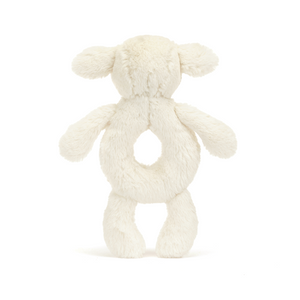  Backside view of the Jellycat Bashful Lamb Ring Rattle, emphasizing its soft vanilla cream fur and cute waggle ears, ready for playtime adventures.