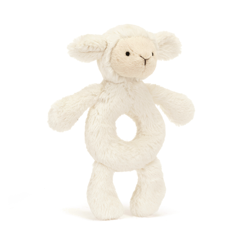 Jellycat Bashful Lamb Ring Rattle at an angle, showcasing its soft vanilla cream fur made from recycled fibers, ring-shaped tummy for easy grasping.