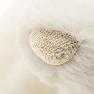 A close up of Jellycat Bashful Luxe Bunny Luna's glittery golden nose.