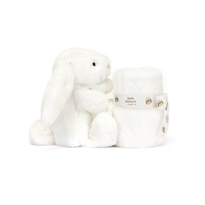 Jellycat Bashful Luxe Bunny Soother from the side, the bunny is holding the neatlly tied soother.