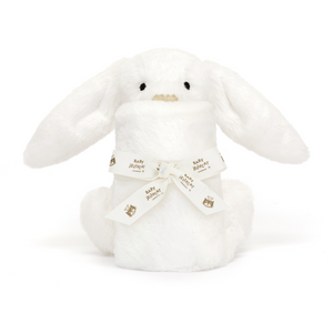 Close up of Jellycat Bashful Luxe Bunny Luna Soother with stitched eyes and gold nose, holding a luxe soother.