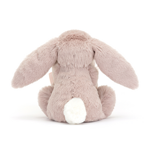 Back View of Jellycat Bashful Luxe Bunny Rosa Soother, showing a fluffy white tail.