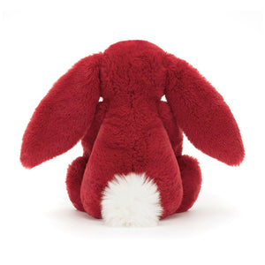 Behind: Back view of Jellycat Bashful Luxe Bunny Scarlett, showing the full length of her tail and the cascading ears.