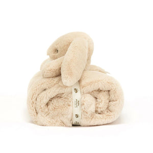 he perfect size for cuddling on-the-go, the Jellycat Bashful Luxe Bunny Willow Blankie rolls up neatly. Featuring luxuriously soft fabric and a sweet bunny companion. (Side view)