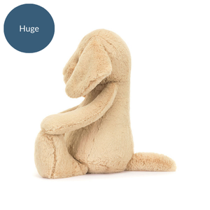 mage 3 (Side Profile - Huge): The side view of the Jellycat Bashful Luxe Puppy Orlando in huge size, displaying its long ears and soft, plush fabric.