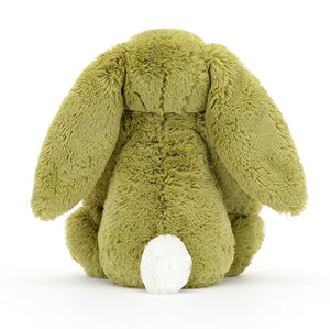 A rear view of Jellycat Bashful Moss Bunny, with soft pistachio green fur and big floppy ears and a fluffy white tail.
