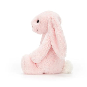 Bedtime buddy goals! Jellycat's Bashful Pink Bunny boasts dreamy pink fur, floppy ears, and a cuddly form perfect for bedtime snuggles and playful adventures.