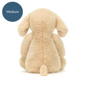 Back view of Jellycat Bashful Luxe Puppy Orlando (Medium), highlighting its fluffy texture, floppy ears, and tiny plush tail.