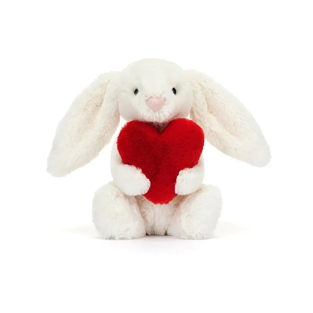 Adorably floppy ears and a plush nose! The Jellycat Bashful Red Love Heart Bunny holds a heart close, offering love every day.