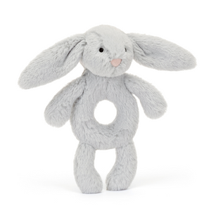 Jellycat Bashful Silver Bunny Ring Rattle at an angle, showcasing its soft fur, long floppy ears, ring-shaped tummy.