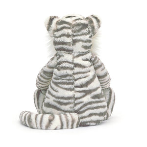 Stripes & softness galore! Jellycat's Bashful Snow Tiger charms with its playful tail, majestic stripes, and fluffy form – a guaranteed cuddle companion.