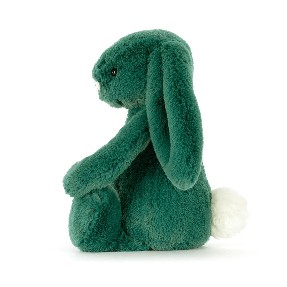Side profile of Jellycat Bashful Teal Bunny Little showing white fluffy tail.