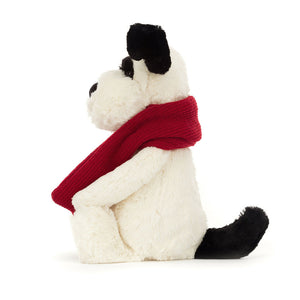  Side view of Jellycat Bashful Winter Puppy plush toy, highlighting his soft fur and berry knit scarf.