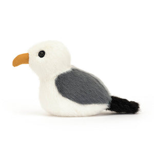 From the side the Jellycat Birdling Seagull children's soft toy.