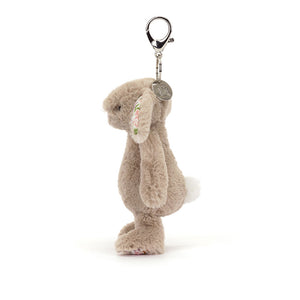 Side view of Jellycat Blossom Beige Bunny ‘Petal’ Bag Charm, showing its petite size and adorable profile.