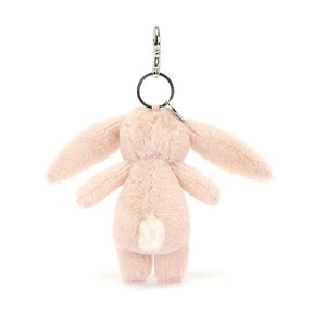 Check out the soft fur & bouncy tail of the Blossom Blush Bunny Charm! This adorable pal clips onto bags, bringing a touch of springtime magic wherever you wander. Hop to it & grab yours!