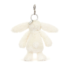 Back view of Jellycat Blossom Cream Bunny ‘Berry’ Bag Charm, featuring the soft fabric and keyring attachment.