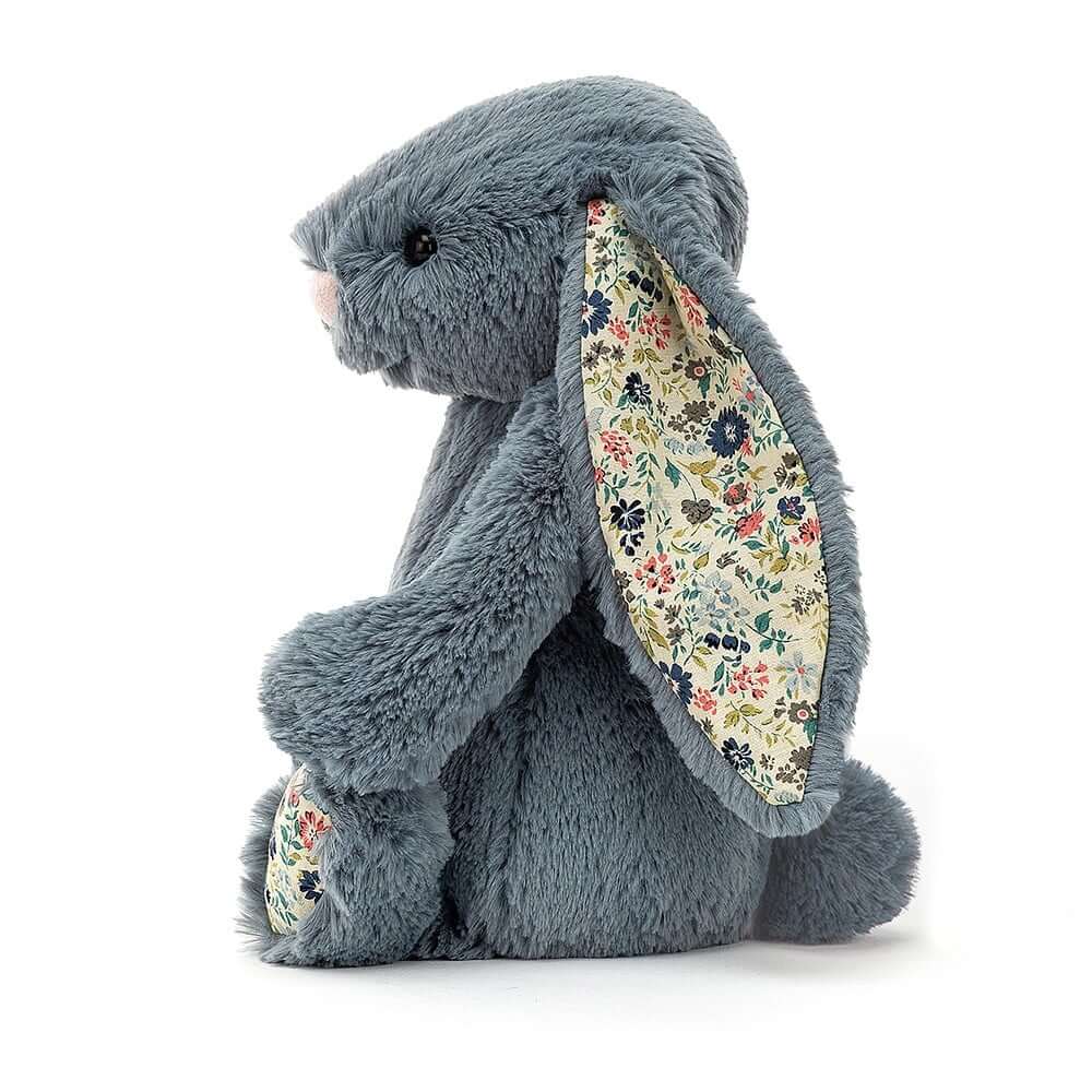 Jellycat Blossom Bunny's tubby figure is irresistible, adorned with delicate floral prints on paws and ears - a touch of springtime magic year-round.
