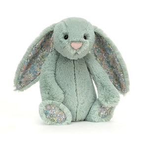 Minty fresh Jellycat Blossom Sage Bunny peeks playfully, showcasing cotton posy ears and paws - a scrumptious springtime friend.