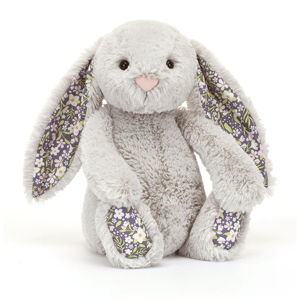 Angle view of Jellycat Blossom Silver Bunny ‘Bloom’, highlighting its cute face and cuddly design.