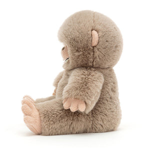 Side View:  Unleash the fun with Jellycat Bo Bigfoot! This 28 cm tall plush features soft fur, adorable toes, and a friendly face, making him a perfect cuddle companion.