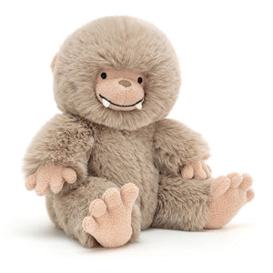 Angled View:  Jellycat Bo Bigfoot (28 cm x 18 cm): A friendly giant with long mocha fur, pink towelling feet, and a gentle smile. Perfect for cuddles and forest adventures!