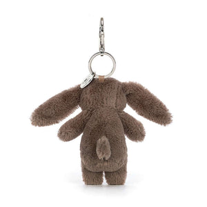 Check out the soft fur & sturdy clip of the Bashful Bunny Truffle Charm! This adorable friend clips onto bags, spreading sweetness wherever you go. Hop to it & grab yours!