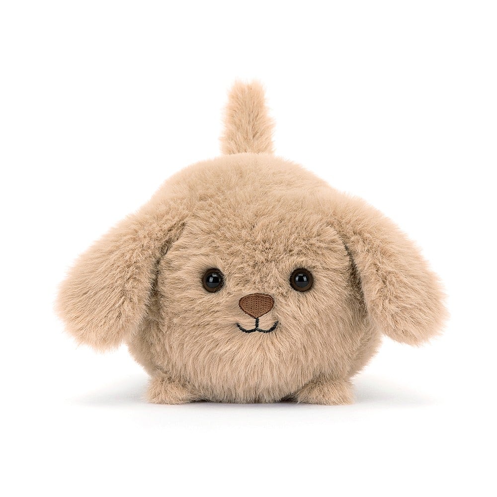 Super-soft snuggles: This frontal view of Jellycat's Caboodle Puppy highlights its adorable face, floppy ears, and perky tail. Perfect for playtime fun.