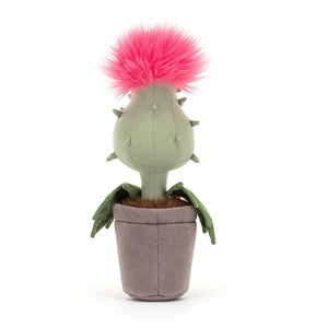 Don't underestimate the sass! Carniflore Priscilla's neon pink hair adds a playful pop to any shelf or collection. A quirky and lovable plush plant, safe for all ages (except little ones). (Jellycat Carniflore Priscilla plush toy)
