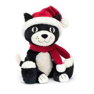 Jellycat Christmas Jack, a cuddly cat with a red velvet hat and scarf, perched playfully.