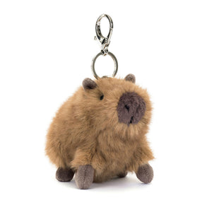 Jellycat Clyde Capybara Bag Charm, angled view, showcasing its soft two-toned fur and adorable suedette details.