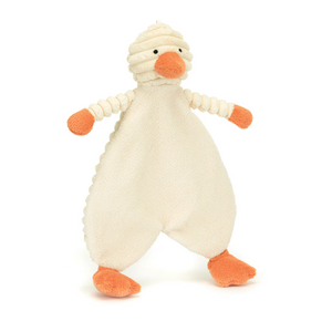 Cuddly Comfort: A Jellycat Cordy Roy Baby Duckling Comforter tilted at an angle, Cream in colour with Orange hands, feet and beak,  ready for bedtime snuggles.