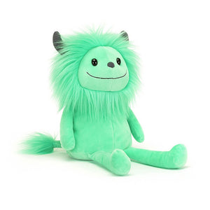 Chidren's soft toy from Jellycat in the shape of a monster called cosmo. Covered head to toe in green fur and with tiny horns on his head.