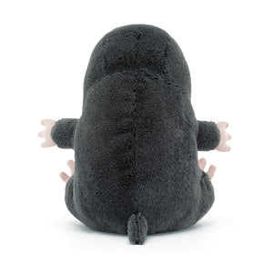 Jellycat Cuddlebud Morgan Mole plush from the back, emphasizing its soft, rounded shape and textured blue-black fur.