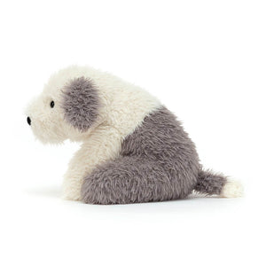 From the side Jellycat Curvie Sheep Dog children's soft toy.