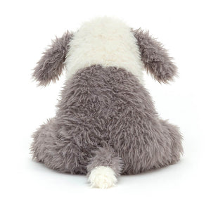 From behind Jellycat Curvie Sheep Dog children's soft toy.
