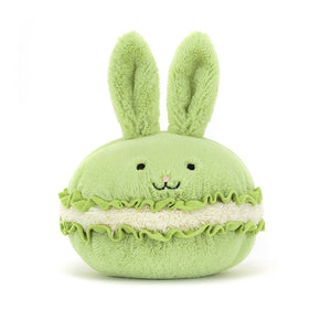 Cuteness overload! This sweet Jellycat Dainty Dessert Bunny Macaron boasts a smiling face, fluffy cream filling, and tousled green ears, perfect for tea parties and cuddles.