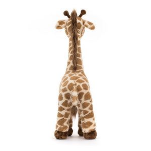 Tailored for giraffe dreams: The back view of Jellycat's Dara Giraffe reveals her soft fur, long neck, and cute tail. Ready for cozy cuddles after exploring.