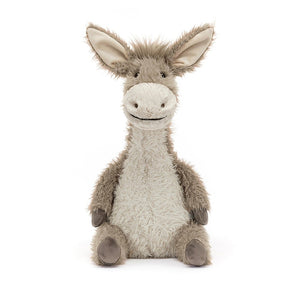 Face-to-face with fun: Dario Donkey from Jellycat boasts endearing embroidered eyes and a playful smile. A huggable pal for endless imaginative journeys.