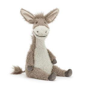 Adventure awaits: Meet Jellycat Dario Donkey, the cuddly companion with a playful spirit. His soft fur, paintbrush tail, and fuzzy ears are irresistible.