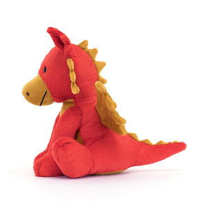 Side view of Jellycat Darvin Dragon, showcasing its textured wings, soft spines, and playful tail.