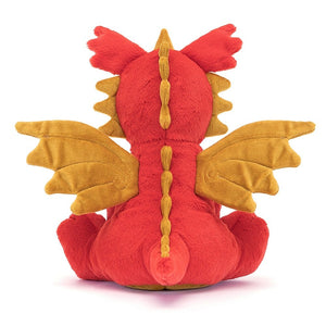 Jellycat Darvin Dragon plush from the back, emphasizing its chunky red tail, embroidered wings, and waggly ears.