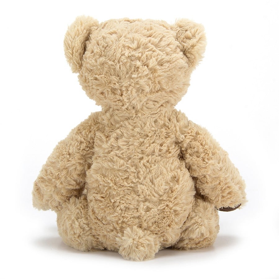 Side View: Ready for adventure! Side view of Jellycat Edward Bear showing soft fur, perky ears, and a curious expression.